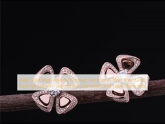 Echt goud High Jewelry Fiorever oorbellen in 18 kt Rose Gold oorbellen met twee centrale diamanten en pavé diamanten