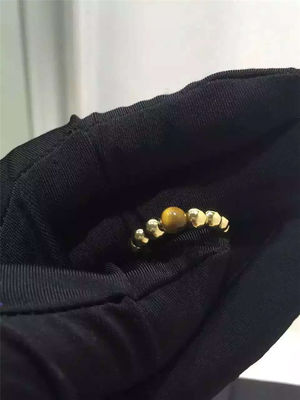 Kwaliteit De Overeenkomsten Gele 18K Gouden Ring van vrouwen om Vorm met het Oogsteen van Tijgers fabriek
