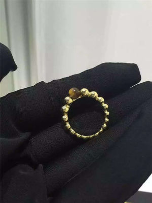 Kwaliteit De Overeenkomsten Gele 18K Gouden Ring van vrouwen om Vorm met het Oogsteen van Tijgers fabriek