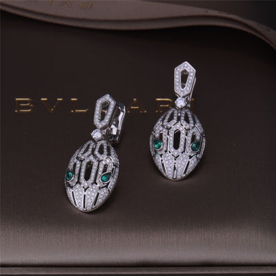 Kwaliteit Oorringen van Serpenti van het luxe de Gouden die Merk in 18K-Witgoud met Emerald Eyes en met pavé het Hoofd van de diamantenslang wordt geplaatst fabriek